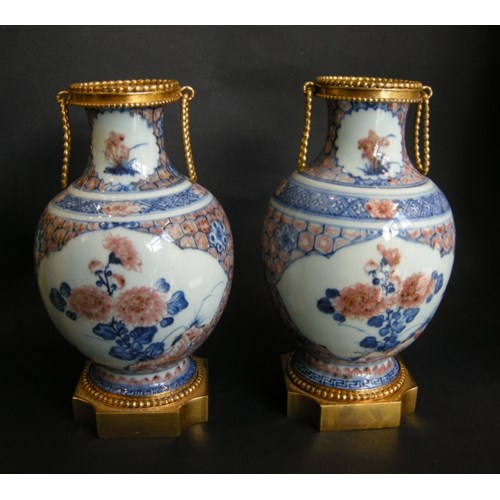 Pair porcelain vases decorated in underglaze blue and copper red